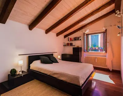 Letto o letti in una camera di Ca’ Orti