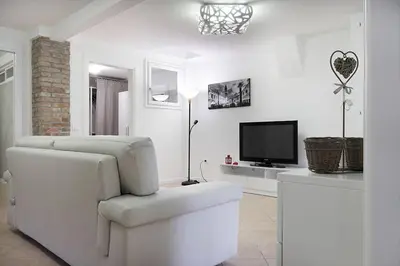 TV o dispositivi per l'intrattenimento presso Al Battello Apartments