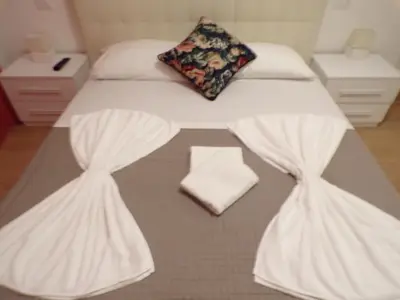 Letto o letti in una camera di Casa Venier