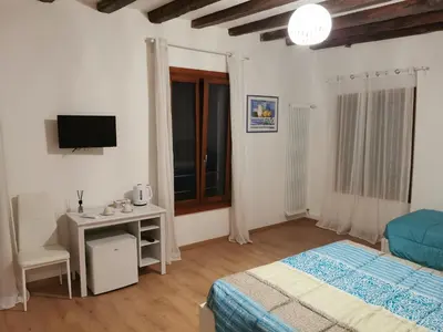 Letto o letti in una camera di Casa Venier