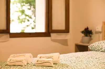 Letto o letti in una camera di Casa Pian di Farnè