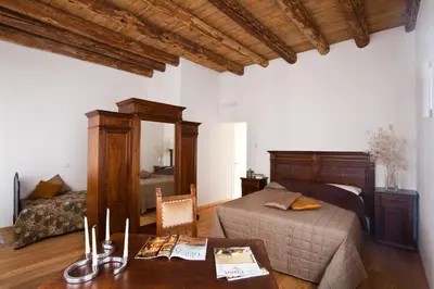 Letto o letti in una camera di B&B Borgo Castello