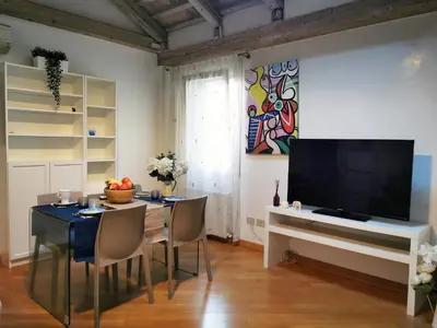TV o dispositivi per l'intrattenimento presso Romantic Sky Apartment