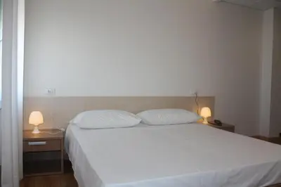 Letto o letti in una camera di Hotel Gronda Lagunare