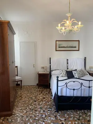 Letto o letti in una camera di B&B Al Teatro with canal view