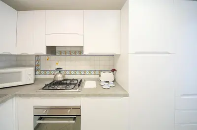 Cucina o angolo cottura di DolceVita Apartments N 465 Biennale