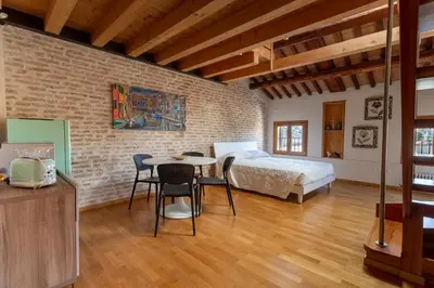 Letto o letti in una camera di Loft Mirano Uno (Alloggi alla Campana)