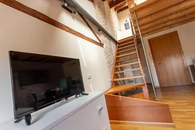 TV o dispositivi per l'intrattenimento presso Loft Mirano Uno (Alloggi alla Campana)
