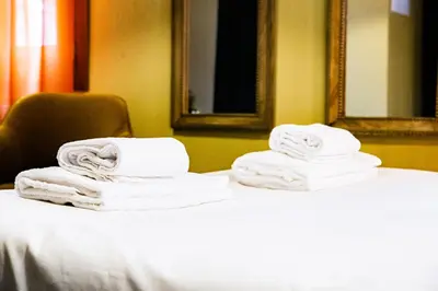 Letto o letti in una camera di Rigoletto Charm