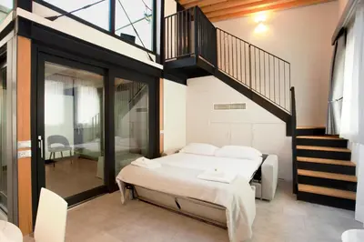 Letto o letti in una camera di Residence 8 Loft