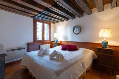 Letto o letti in una camera di Fortuny 3967 Luxury suites wine