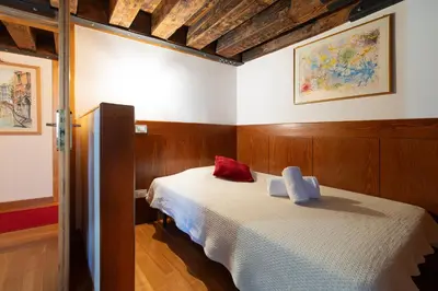 Letto o letti in una camera di Fortuny 3967 Luxury suites wine