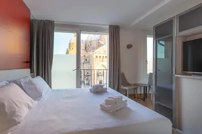 Letto o letti in una camera di Padova Suites C20