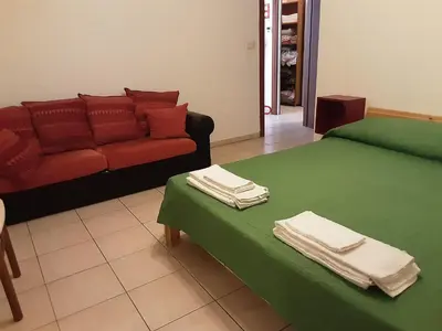 Area soggiorno di Locazione Menini - Appartamento zona stazione
