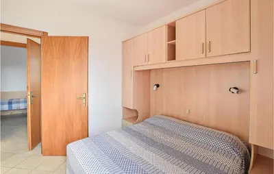 Letto o letti in una camera di Appartamento Eden