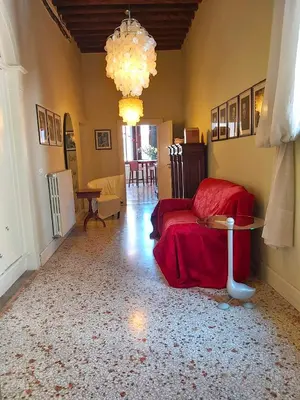 Area soggiorno di GORGEOUS VENETIAN APARTMENT WITH CANAL VIEW