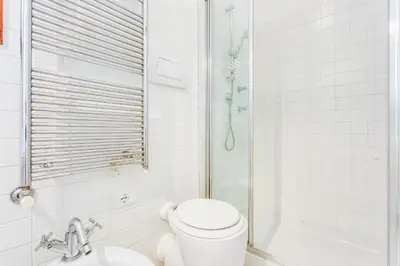 Bagno di GuestHost - Ca Lu Vintage Flat con Vista su San Marco!
