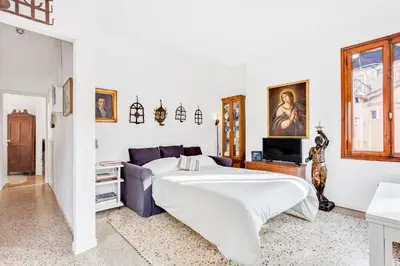 TV o dispositivi per l'intrattenimento presso GuestHost - Ca Lu Vintage Flat con Vista su San Marco!
