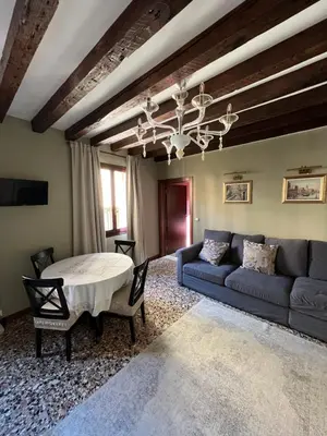 Area soggiorno di Wow suite 5 min from San Marco
