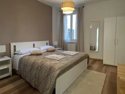 Letto o letti in una camera di CIVICO 57 Al Santo - PADOVA