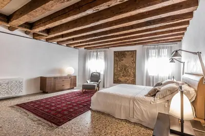 Letto o letti in una camera di La Corte dei Cuoridoro 2 Canal View