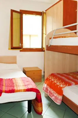 Letto o letti in una camera di Apartment Solmare-6 by Interhome