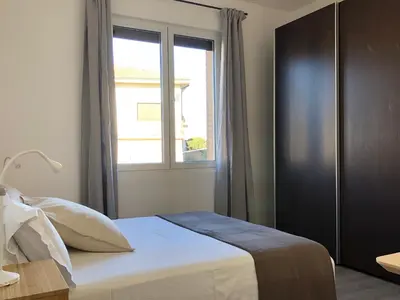 Letto o letti in una camera di Residenza Pedrotti Family