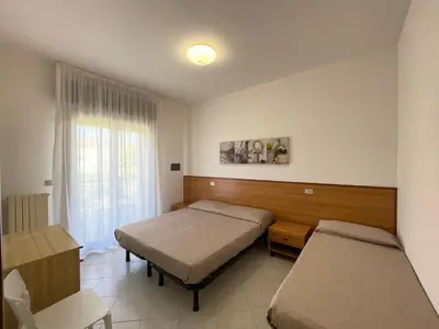 Letto o letti in una camera di Villa Daniela - Carraro Immobiliare - Family Apartments