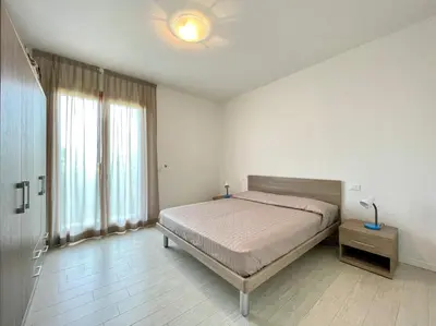 Letto o letti in una camera di Residence Treporti - Carraro Immobiliare - Family Apartments