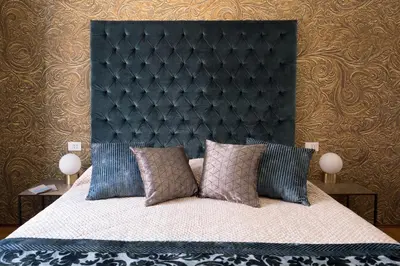 Letto o letti in una camera di B&B Cà del Poeta