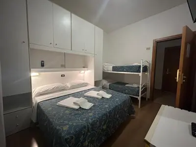 Letto o letti in una camera di Hotel Neps