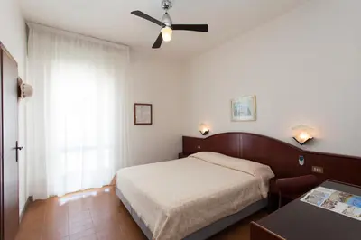Letto o letti in una camera di Hotel Arborea