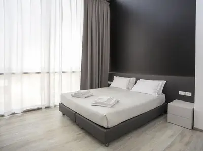 Letto o letti in una camera di HTM Venice Suite by Halldis