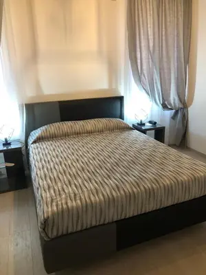 Letto o letti in una camera di Marin Traghetto - Locazione Turistica
