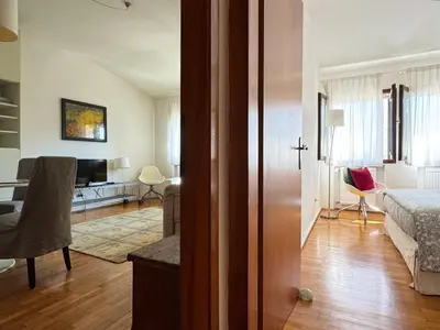 Letto o letti in una camera di Le case di Rachele - Ca' Lorenzo e Ca' Raquel