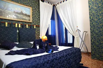 Letto o letti in una camera di VENICE RAINBOW APARTMENT (RIALTO)