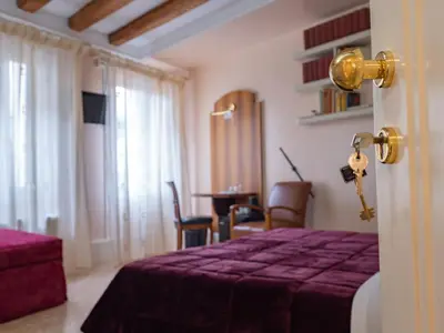 Letto o letti in una camera di B&B a le Boteghe
