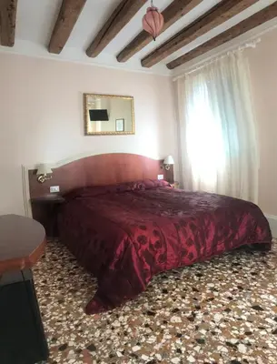 Letto o letti in una camera di B&B a le Boteghe