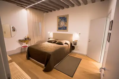 Letto o letti in una camera di Specchieri