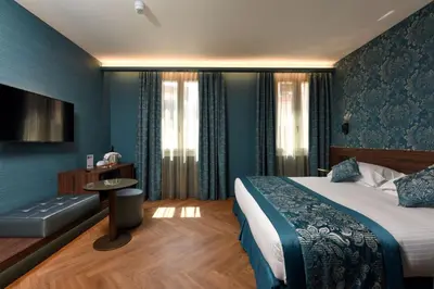 Letto o letti in una camera di Rosa Salva Suites