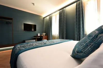 Letto o letti in una camera di Rosa Salva Suites
