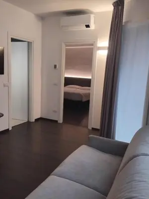 Letto o letti in una camera di Venice Terminal Apartments & Suites