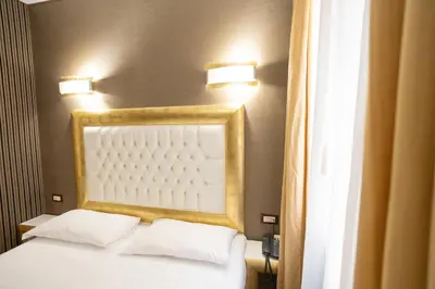 Letto o letti in una camera di Duomo Boutique Hotel