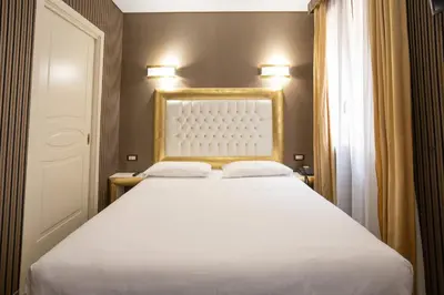 Letto o letti in una camera di Duomo Boutique Hotel