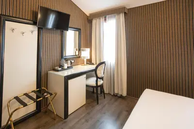Letto o letti in una camera di Duomo Boutique Hotel