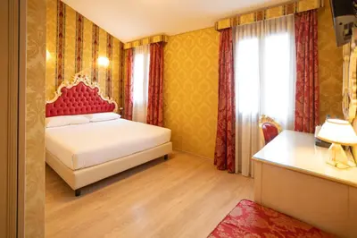 Letto o letti in una camera di Duomo Boutique Hotel