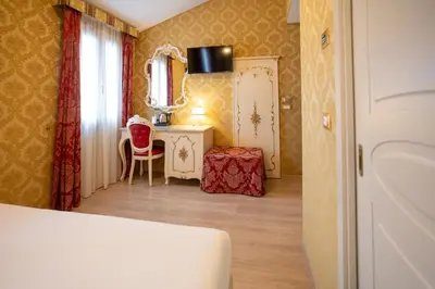 Letto o letti in una camera di Duomo Boutique Hotel