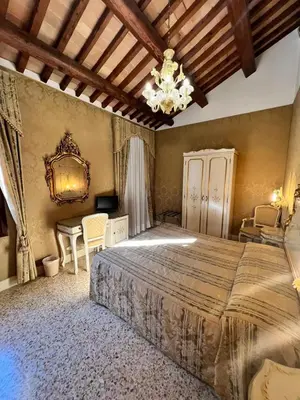 Letto o letti in una camera di Hotel Ca' Dogaressa
