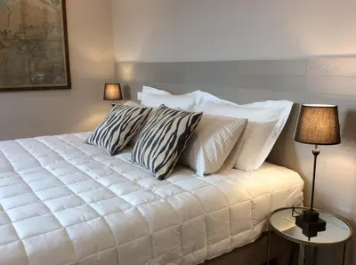 Letto o letti in una camera di Villa Fiorentino