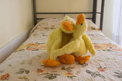 Letto o letti in una camera di Le Petit Hotel